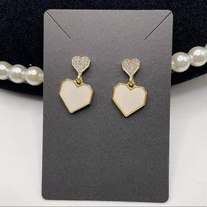 New white heart dangle pierced earrings